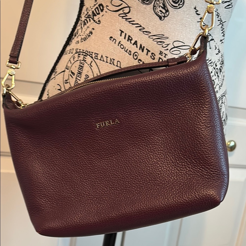 Pre-loved Furla Burgundy two way bag with Pebbled Texture.